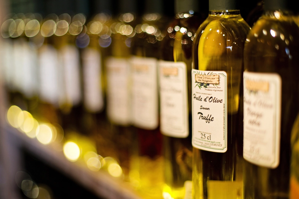 Olive oil bottles store shelf